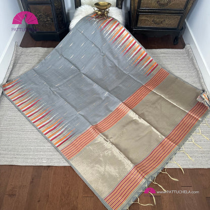 Semi Tussar Silk Saree in grey with designer temple borders