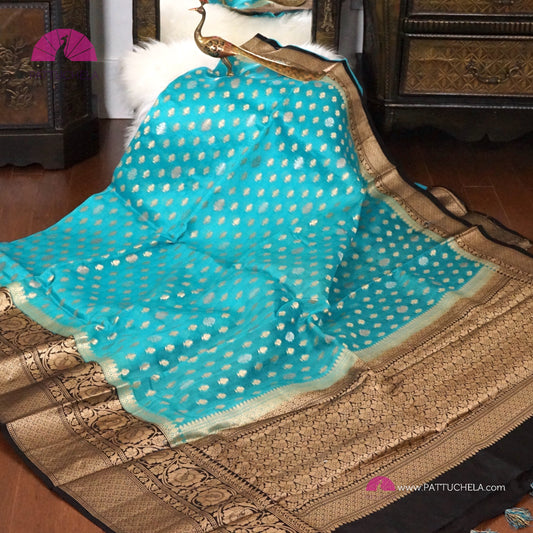 Deep Sky Blue Banarasi Kora Silk handloom Saree with Contrast Black Zari woven Borders
