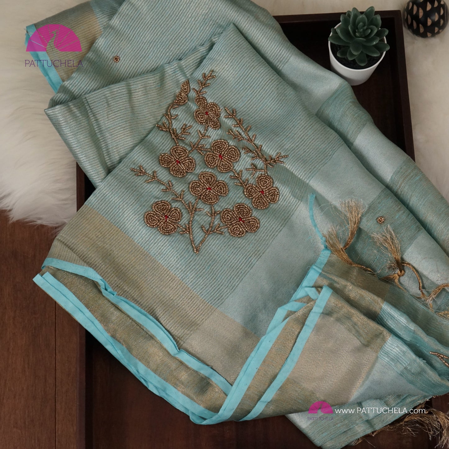 Organic Polka Dotted Pastel Blue Tissue Linen Saree with Hand embroidery