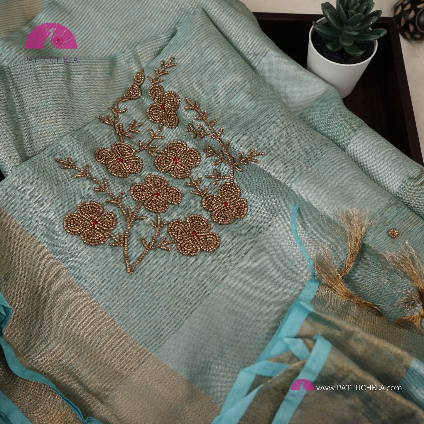 Organic Polka Dotted Pastel Blue Tissue Linen Saree with Hand embroidery