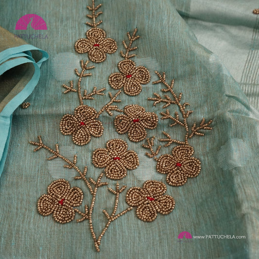 Organic Polka Dotted Pastel Blue Tissue Linen Saree with Hand embroidery