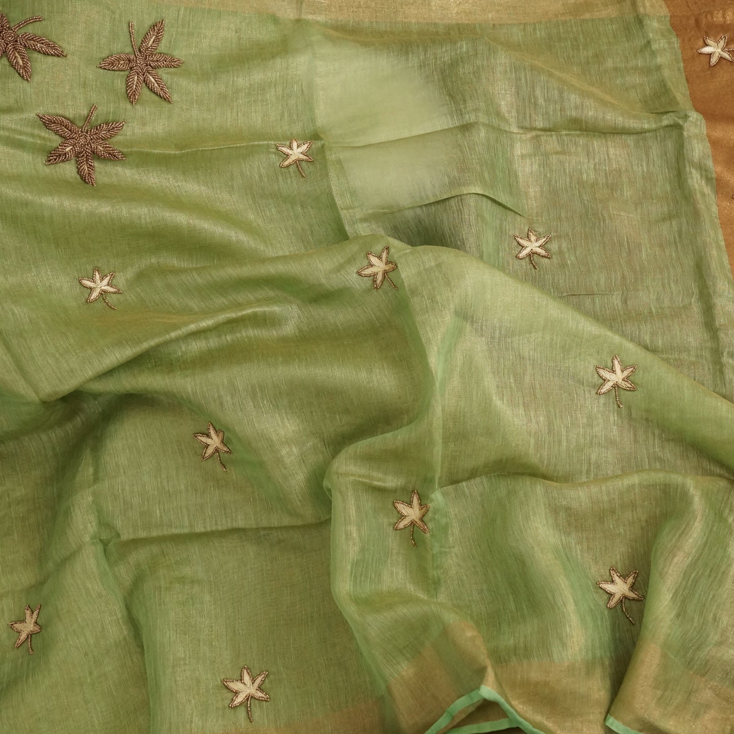 Organic Pastel Lime Green Tissue Linen Saree with Hand embroidery