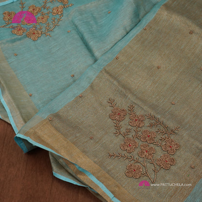 Organic Pastel Powder Blue Tissue Linen Saree with Hand Embroidery