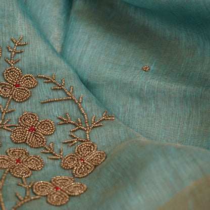 Organic Pastel Powder Blue Tissue Linen Saree with Hand Embroidery