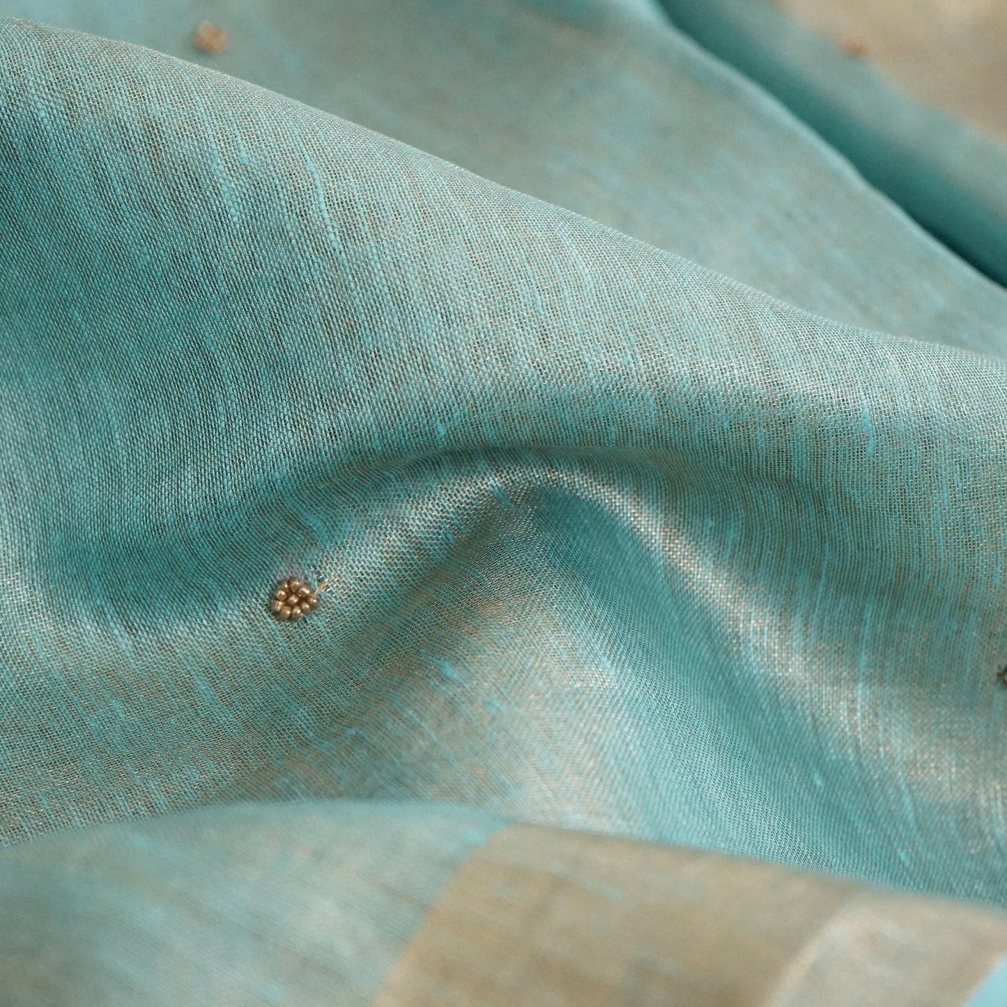 Organic Pastel Powder Blue Tissue Linen Saree with Hand Embroidery