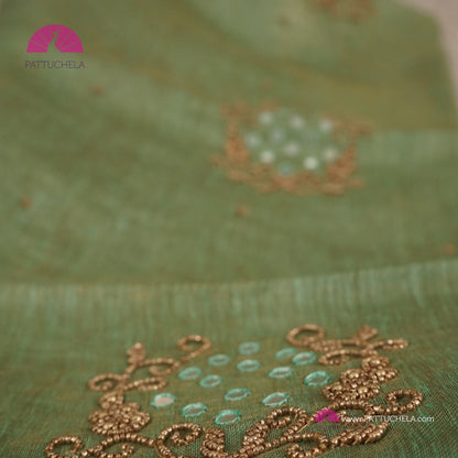 Organic Tissue Linen Saree in Pastel Green with Mirror Work and Hand Embroidery