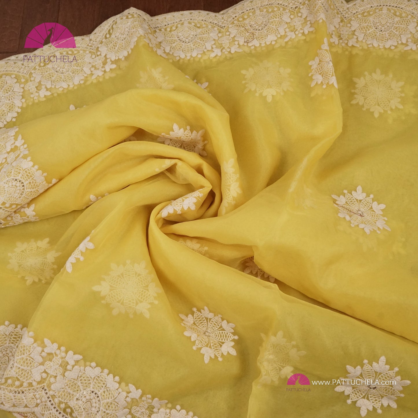 Pastel Yellow Organza Saree with Scalloped Chikankari Border