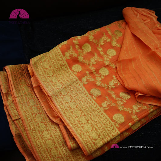 Gorgeous Khaddi Banarasi Georgette Silk handwoven Saree in pastel peach orange color